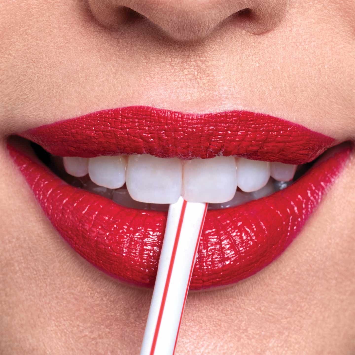 Lips wearing Super Stay24h 2step Lipcolor bitting straw